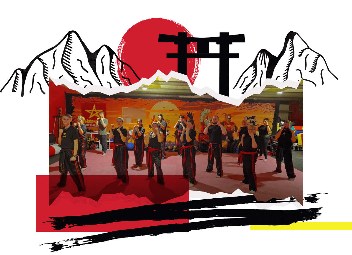 A room full of adults in martial arts uniform posed in fighting stances